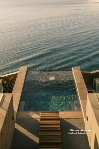Infinity edge small pool design for visual expansion and luxury compact backyard with seamless open horizon effect