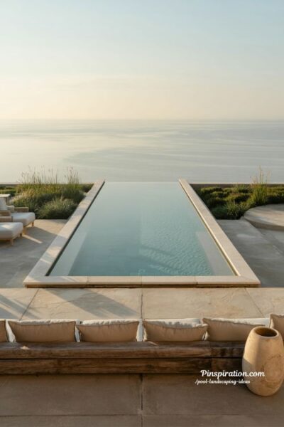 Infinity edge pool landscaping ideas with open horizon backyard views