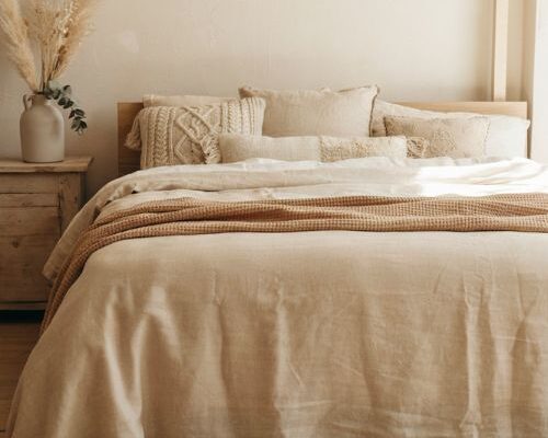 Luxurious oatmeal linen bedding set for a cozy coastal bedroom retreat
