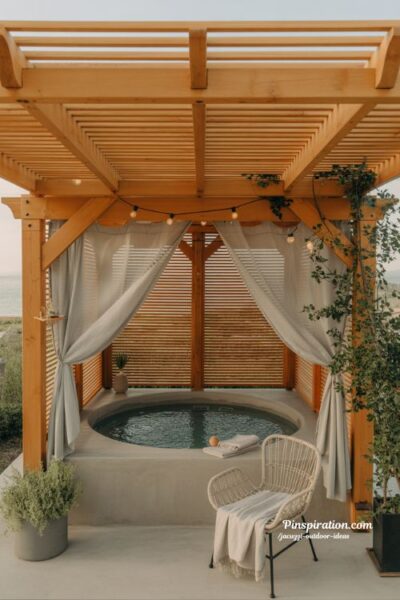 Pergola covered jacuzzi outdoor ideas with curtains climbing plants and cozy backyard spa lighting
