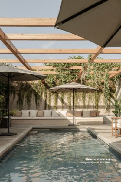 Shade-friendly backyard pool ideas with pergola and natural greenery for outdoor comfort