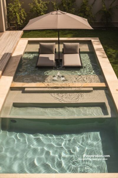 Tanning ledge backyard pool ideas with shallow sun shelf and modern relaxation design