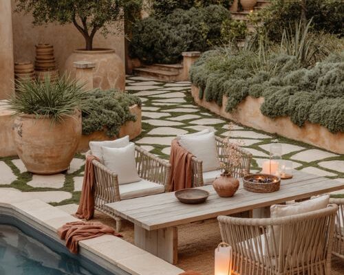 Warm mediterranean pool landscaping ideas with cozy evening lighting