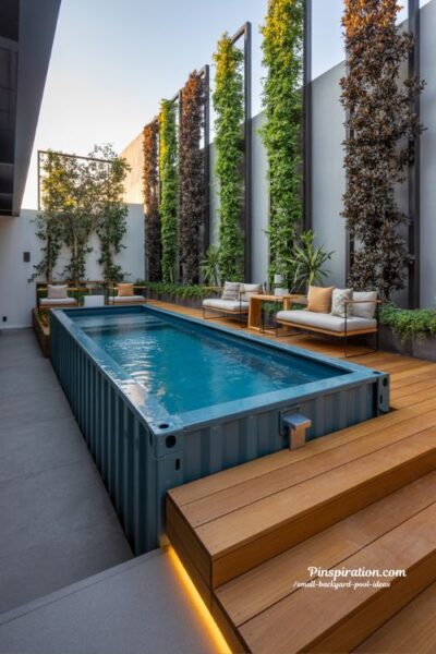 modern container pool backyard design with industrial style shipping container plunge pool and warm wood decking