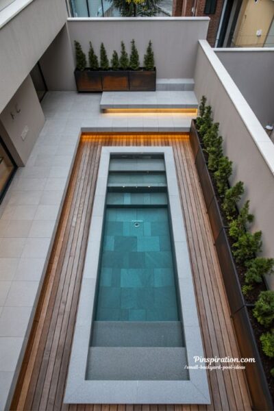 modern geometric backyard pool with clean lines and minimalist small space outdoor design