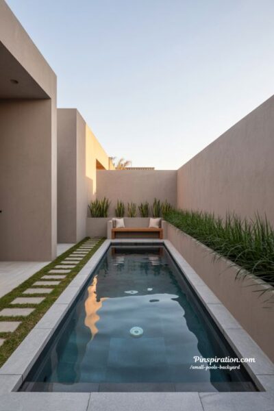 narrow backyard lap pool design with clean modern lines and minimalist style