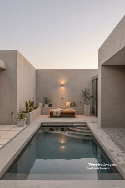 small backyard concrete pool with clean modern lines and minimalist design