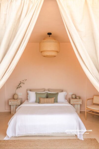 soft pink coastal guest suite with sage green accents and calming garden aesthetic
