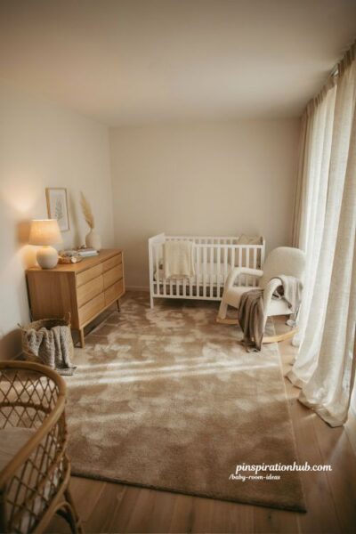 Baby room ideas with plush statement rug and warm neutral nursery decor