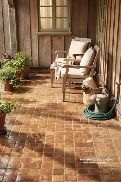 Clean brick back porch patio with restored rustic textures and cozy outdoor seating