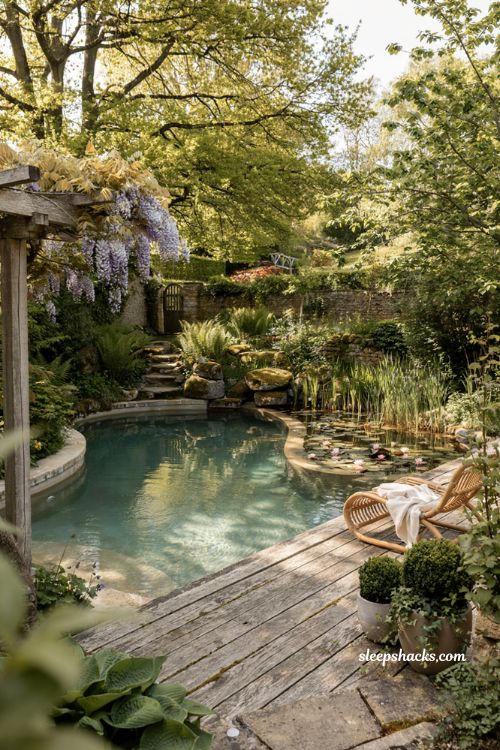 Natural pool ideas with a mountain lake inspired backyard swimming oasis