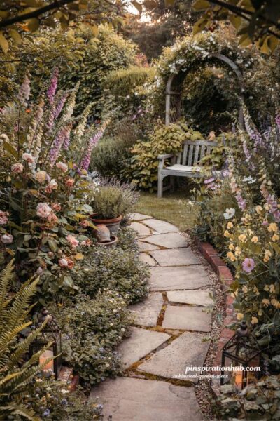 Whimsical garden stone path with creeping thyme and cottage flower borders at dusk