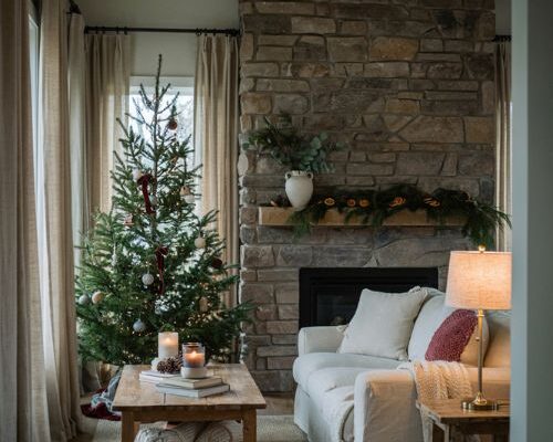 Christmas decor ideas for living rooms with muted sage green and cranberry accents