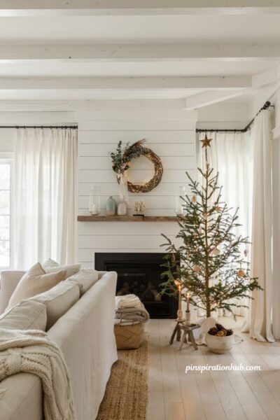 Coastal christmas living room with natural rattan wreath and elegant beach house holiday decor