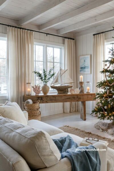 Coastal christmas living room with nautical accent decor and elegant beach house holiday styling