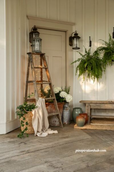 Farmhouse porch ideas with a reclaimed wood ladder and vintage rustic charm