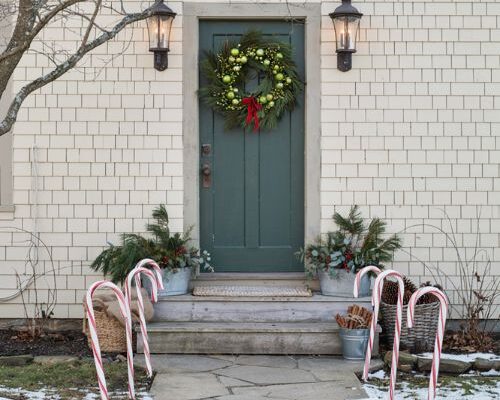 Grinch christmas decorations with oversized candy cane walkway accents