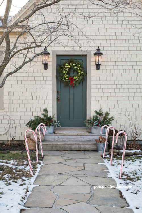 Grinch christmas decorations with oversized candy cane walkway accents