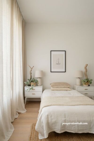 Neutral coastal bedroom with olive tree eucalyptus and natural greenery accents