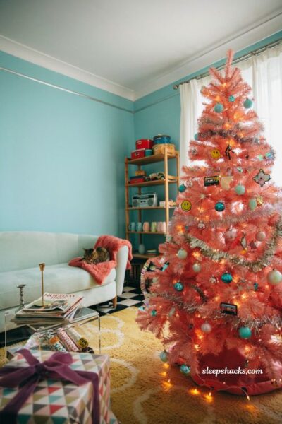 Pink christmas tree ideas with nostalgic 90s retro holiday decorations