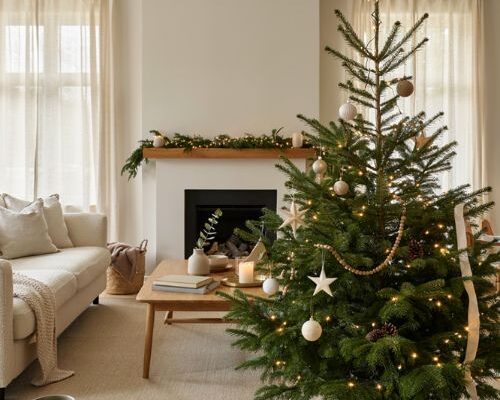 Pre lit christmas tree with simple Scandinavian farmhouse holiday living room decor