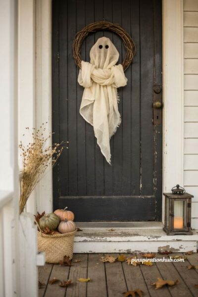 Cheesecloth ghost wreath for charming diy Halloween door decor