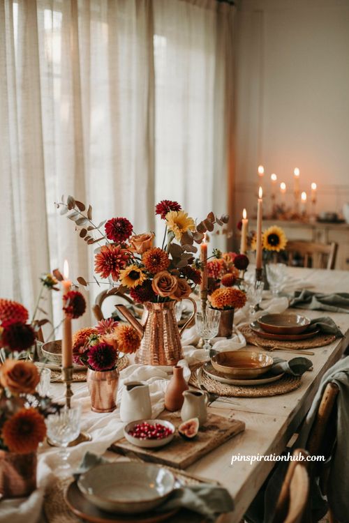 Copper centerpiece with warm fall blooms for an elegant cozy autumn dining table