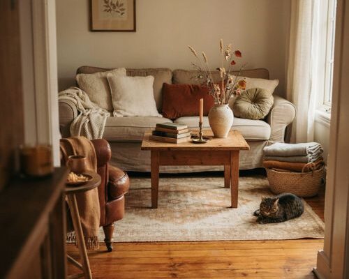 Cozy autumn living room with warm textures and soft fall colors