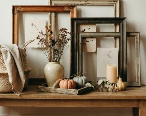 DIY framed Halloween printable decor with thrifted frames and cozy mantel accents