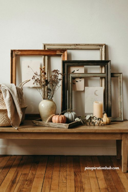 DIY framed Halloween printable decor with thrifted frames and cozy mantel accents