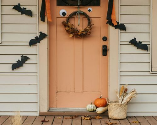 Diy halloween door decorations with googly eyes crepe paper and pumpkins