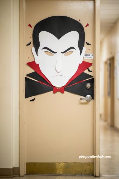 Dracula cape door with black red and white Halloween classroom decorations