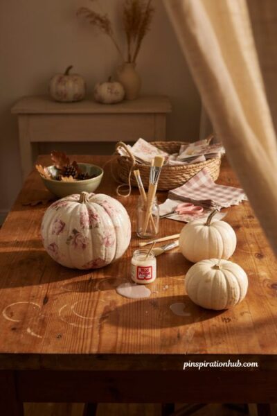 Fall crafts for adults with mod podge painted pumpkins and floral napkins