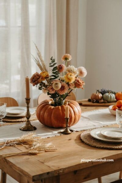 Glass insert pumpkin flower centerpiece with fresh fall blooms for farmhouse table decor