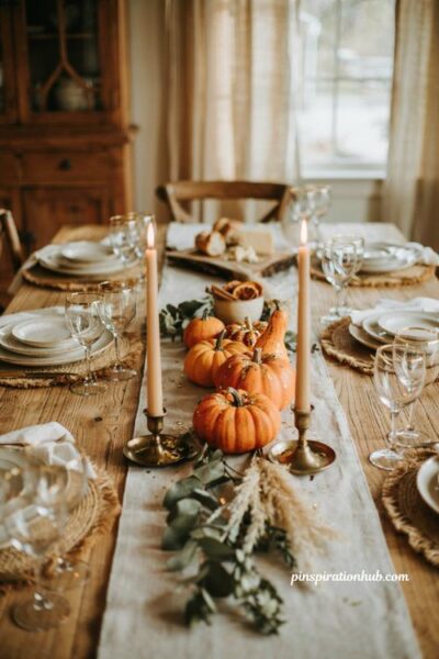 Gold confetti pumpkin centerpiece idea for an elegant fall birthday table decor