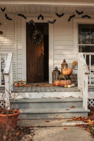 Halloween porch ideas with layered decor at different heights