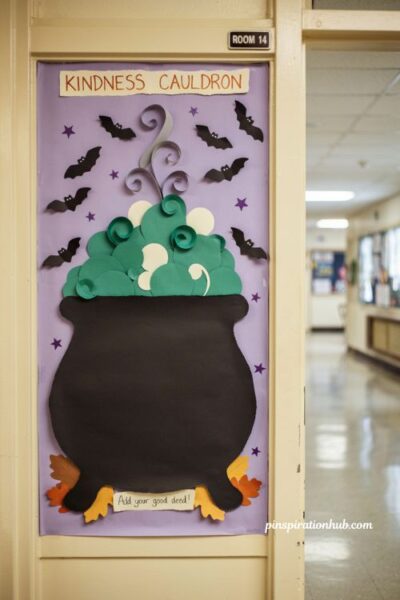 Witch cauldron kindness door for creative Halloween classroom decorations