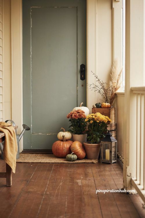 fall outdoor decor front porch with pumpkins and mums