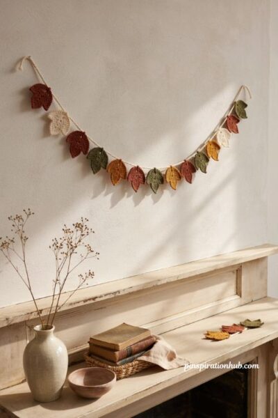Crochet autumn leaf garland ideas in rust gold olive and brown for a cozy fall mantel
