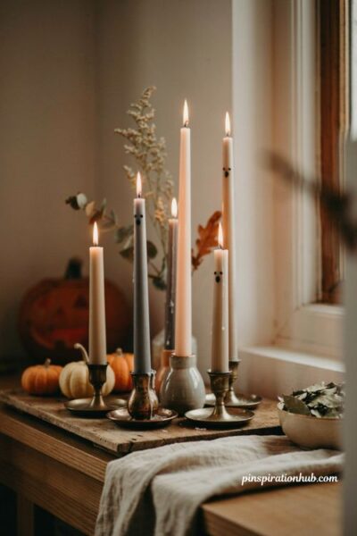 DIY curved melted Halloween candles with spooky painted eyes