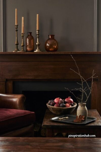 Elegant Halloween decor with amber glass brass and dark wood