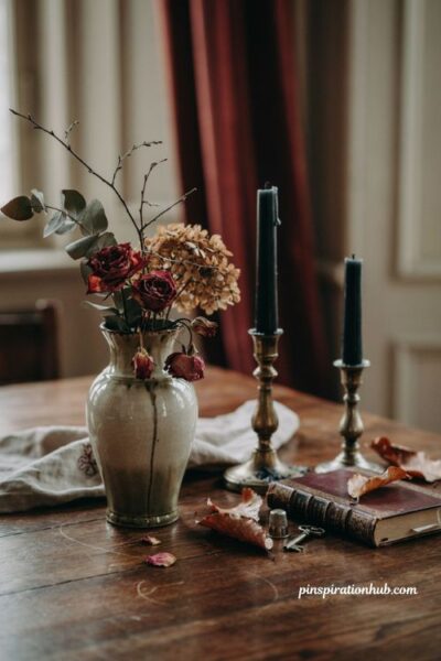 Elegant Halloween decor with dried flowers and dead leaves