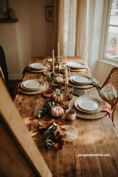 Fall dining table decor with woven placemats wooden coasters and rustic natural textures