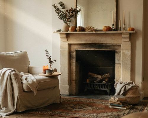Fall mantel decor ideas with cozy pumpkins dried branches vintage textures and warm autumn colors