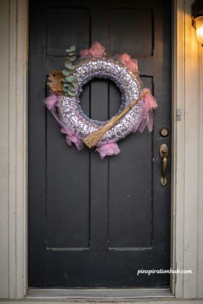 Glam purple pink disco ball Halloween wreath with witch broom