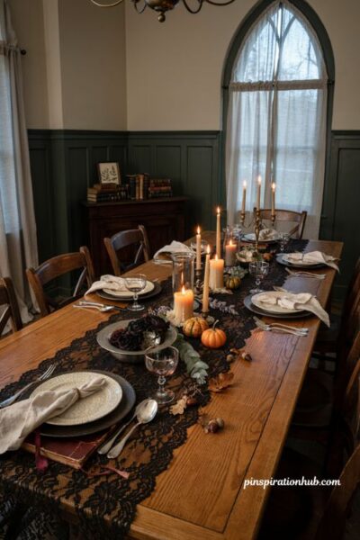Halloween dining table decor with black lace runner and candles