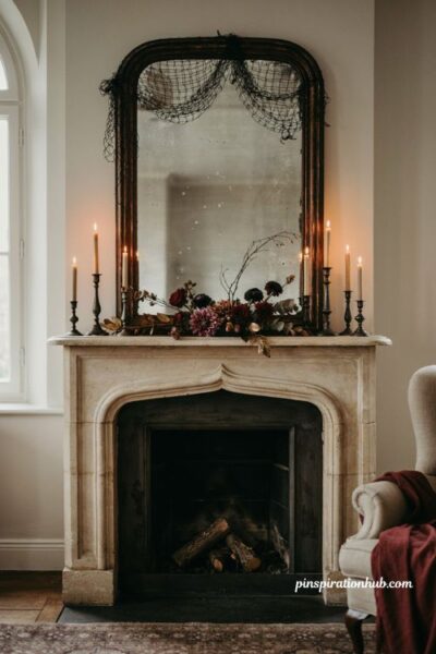 Halloween mantle ideas with antique mirror black candlesticks and dark florals