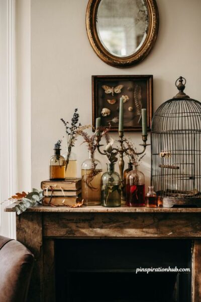 Halloween mantle ideas with vintage apothecary bottles books and candelabra