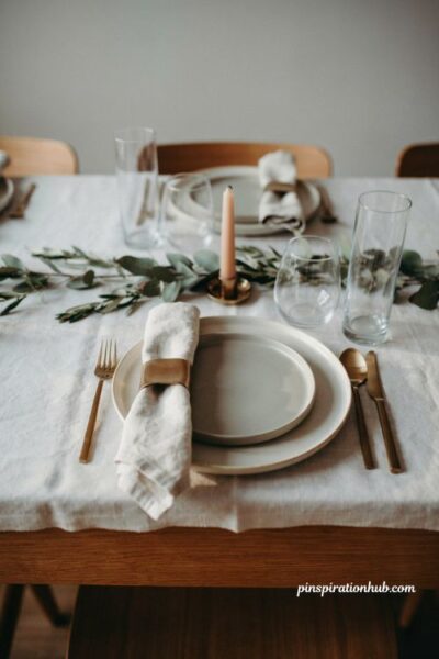 Modern Thanksgiving table with geometric brushed gold napkin ring