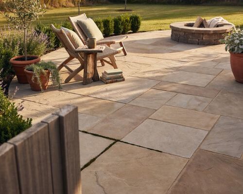 Paver patio ideas with natural stone seating and cozy backyard design